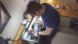 man working on computer